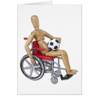 HoldingSoccerBallWheelchair