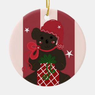 Holiday Teddy Bear auf einem rot gestreiften Hinte Keramikornament