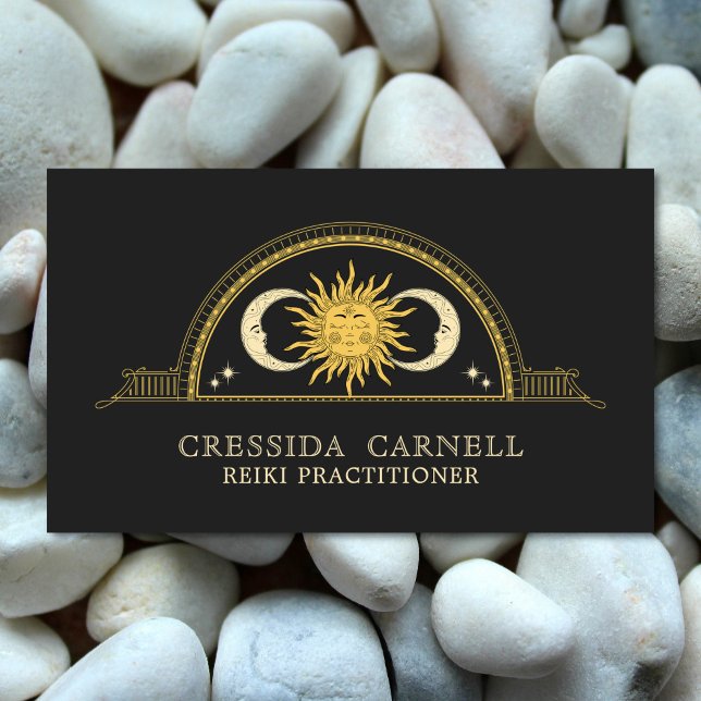 Holistic Celestial Sun & Moon Mystical Cosmic Visitenkarte (Celestial sun and moon Reiki Practitioner business card. Shown with a white pebble background.)