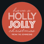Holly Jolly Red Christmas Runder Aufkleber<br><div class="desc">Benutzen Sie diesen fröhlich roten Aufkleber als Geschenkmarke für all Ihre Weihnachtsgeschenke und Weihnachtsgeschenke. Ändern Sie den Namen in Ihren eigenen Namen,  und passen Sie ihn an,  um die Hintergrundfarbe zu ändern.</div>