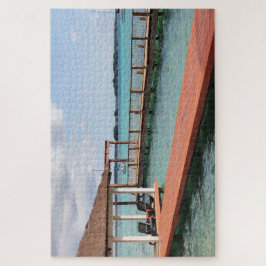 Holzanleger über türkisfarbenem Wasser Puzzle