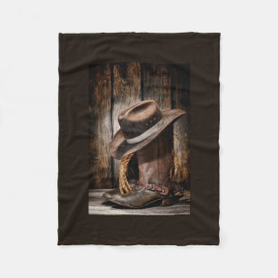 hölzerne Cowboystiefel der Westernlandbraunscheun Fleecedecke
