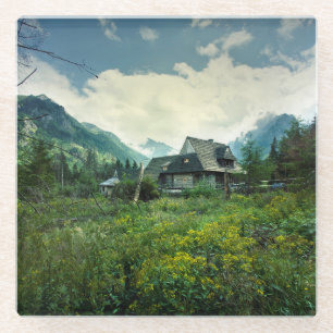 Holzhaus, Berglandschaft. Glasuntersetzer