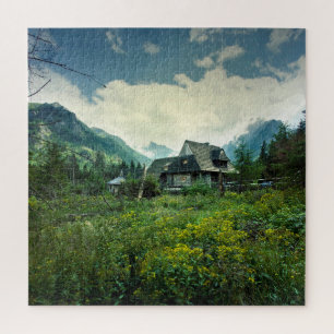 Holzhaus, Berglandschaft. Puzzle