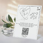 Honeymoon Fund Sign Wedding Cash Gift Sockelschild<br><div class="desc">Unser handgezeichnetes Flitterwochenfondsschild ist ideal, um einen Rahmen zu einem Geschenktisch hinzuzufügen. Die Gäste können Barspenden für Ihre Flitterwochen direkt von ihrem mobilen Gerät aus senden, indem sie den QR-Code einscannen. Dieser Artikel ist Teil unserer handgezeichneten Hochzeitssuite, besuchen Sie bitte unseren Shop, um die Sammlung von koordinierenden Gegenständen zu sehen....</div>