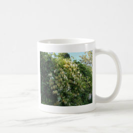 Honigsauce an einer Mauer Tasse
