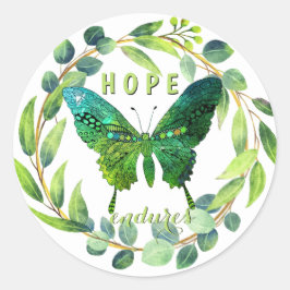 Hope hält Blumenschmetterlingskleber fest Runder Aufkleber