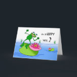 Hoppy Second Birthday, Funny Frog am Pond Karte<br><div class="desc">Ein lustiger und fröhlicher Frosch auf einem Lilienpolster ist auf dem Cover dieses Ich bin so Hoppy You're 2 Geburtstagskarte. Cartoon Illustration in Grüntönen,  Druckfarben und Blues. Frog Element mit freundlicher Genehmigung von OpenClipArt. Bild und Vers Copyright © 2014,  Shoaff Ballanger Studios.</div>