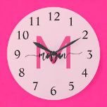 Hot Pink Modern Script Girl Monogram Name Große Wanduhr<br><div class="desc">Machen Sie mit unserer Hot Pink Modern Script Girly Monogram Name Large Clock eine mutige Aussage in Ihrem Raum! Mit einem lebhaften, heißen rosa Design und personalisiert mit Ihrem Namen in einem eleganten, modernen Drehbuch fügt diese Uhr jedem Zimmer eine stilvolle und persönliche Touch hinzu. Ideal für Schlafzimmer, Büroräume oder...</div>