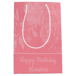 Hübsch rosa auf rosa, floraler Hintergrund Mittlere Geschenktüte