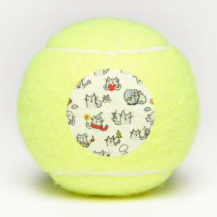 Hübsche Katzen, Milch und Magie. Tennisbälle