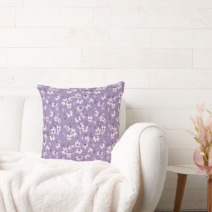 hübsche kleine weiße violette Blume mit blauem Hin Kissen