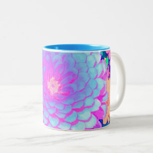 Hübsche lila und rosa Zinnia im Sommergarten Zweifarbige Tasse