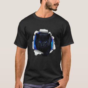 Hübsche schwarze Katze blaue Augen rissige Wand Ka T-Shirt