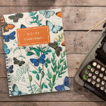 Hübsche Vintage Schmetterlinge Blauer Orangenname Notizblock<br><div class="desc">Dieses hübsche, stilvolle Notizbuch zeichnet sich durch ein Vintages Schmetterlingsdesign in Blau, Hellblau, Braun, Orange, Rosa und Grün aus. Kleine Raupen fügen eine niedliche Touch hinzu. Textdateien sind für eine einfache Personalisierung enthalten. Ideal für viele Anwendungen - zurück zur Schule, zum Business, zu den Reisebüchern, zur Uni und vieles mehr!...</div>