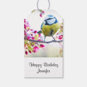 Hübscher blauer und gelber Vogel auf einem Ast zum Geschenkanhänger
