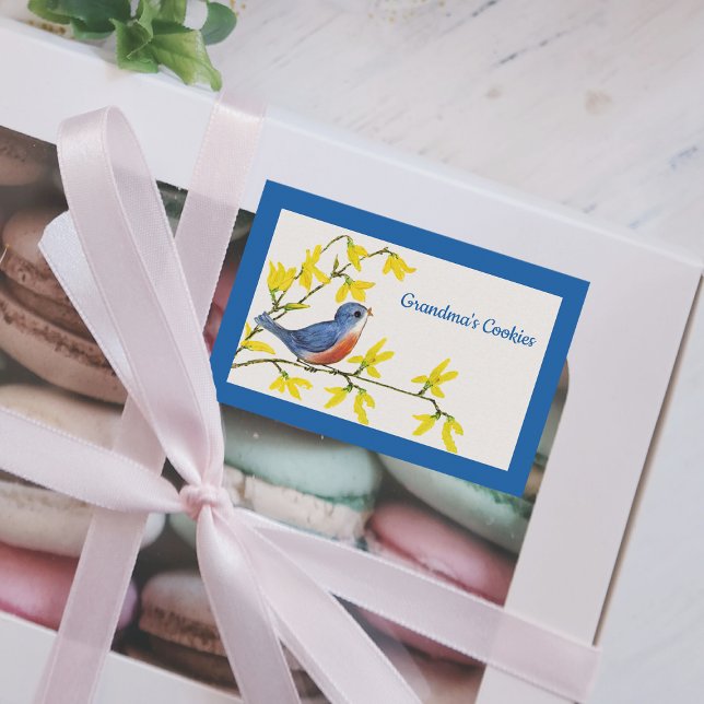 Hübscher Gesang Rot und Blauer Vogel auf Zweigstel Lebensmitteletikett (Cute singing blue red bird on branch with bright yellow flowers blue border food container label.)