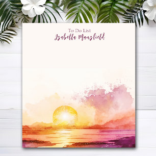 Hübscher Strand und Sonnenuntergang unter dem Mott Notizblock