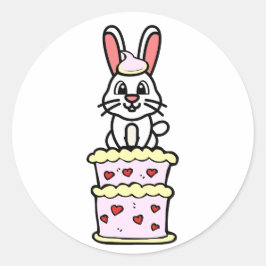 Hübsches Kaninchen springt aus einem Kuchen Runder Aufkleber