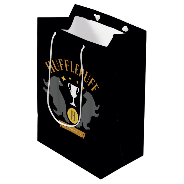 HUFFLEPUFF™ Badger und Cup House Pride Grafik Mittlere Geschenktüte (Vorderseite Schrägansicht)