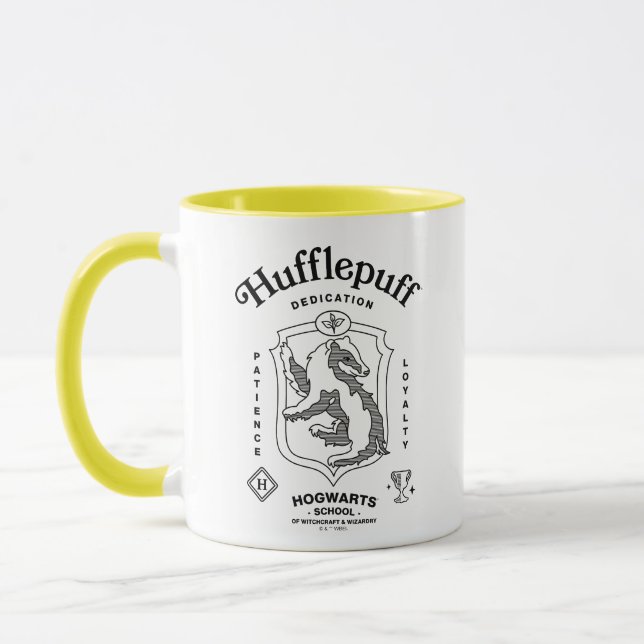 HUFFLEPUFF™ Hingabe Geduld Loyalität Wappen Tasse (Links)