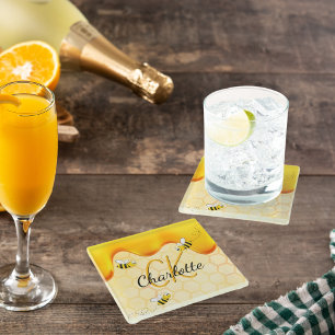 Hummelbienen, Honigwabenhonig, das ein Monogramm t Glasuntersetzer