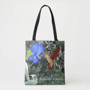 Hummingbird und Blauer Hibiskus mit tropischen Pfl