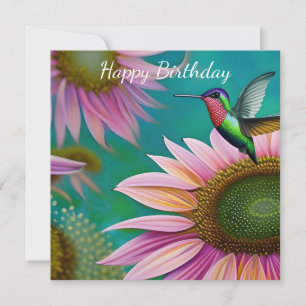 Hummingvogel und rosa Sonnenblumen