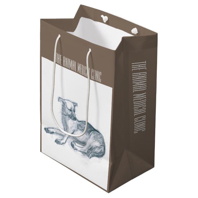 Hund. Bleistift zeichnend. Mittlere Geschenktüte (Vorderseite Schrägansicht)