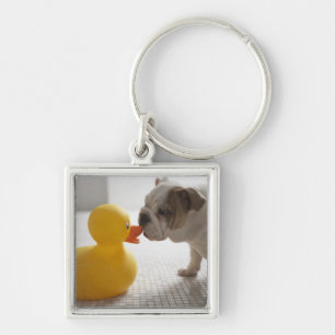 Hund mit Plastikente Schlüsselanhänger