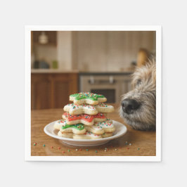 Hund schnuppert an Weihnachts-Zuckerkeksen Serviette