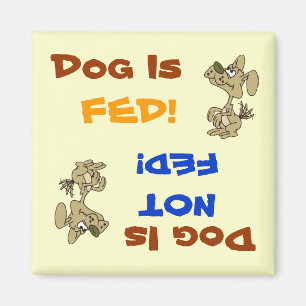 Hund wird gefüttert,/nicht gefütterter Magnet