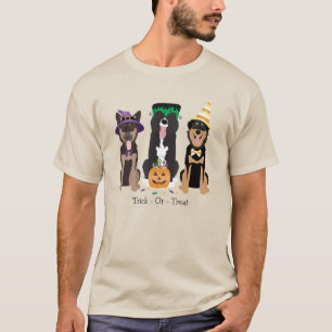 Hunde in Halloween-Kostümen probieren oder behande T-Shirt