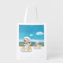 Hunde und Katzen Fahrradfahren am Meer