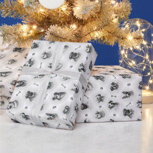 Hundsmuster mit Knochen und Pfotendrucken für Geschenkpapier
