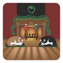 Huskies des Urlaubs durch die Feuerstelle