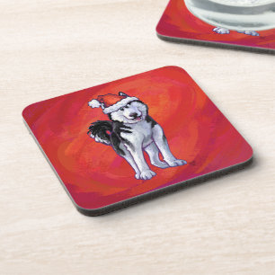 Husky in Weihnachtsmannmütze auf Rot Getränkeuntersetzer