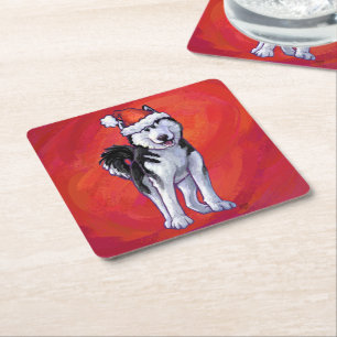 Husky in Weihnachtsmannmütze auf Rot Rechteckiger Pappuntersetzer