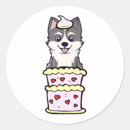 Husky springt aus einem Kuchen Runder Aufkleber