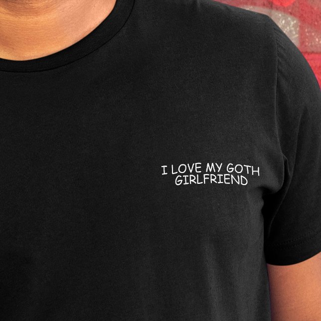 I Liebe My Goth Girlfriend White Comic Sans Funny T-Shirt ("I love my goth girlfriend" in white comic font on crest of black t-shirt)