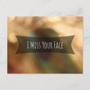 "I Miss Your Face" über verschwommenes Bokeh-Foto Postkarte