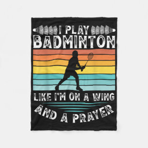 Ich spiele Badminton wie ich auf einem Flügel und Fleecedecke