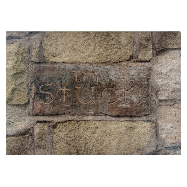 "Ich stecke fest" ein anderer Stein in der Wand Schneidebrett (Vorderseite)