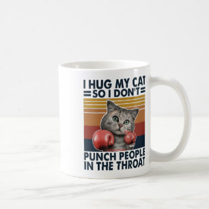 Ich umarmte meine Katze, damit ich keine Leute in Kaffeetasse