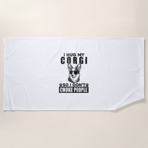 Ich umarmte meinen Corgi, damit ich nicht Leute er Strandtuch