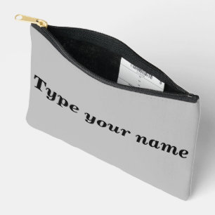 Ihr Name auf grauer Tasche