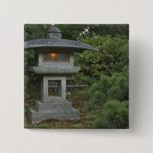 Illuminated stone lantern in Japanese Garden Button