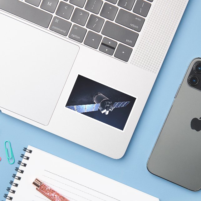 Illustration der Dragon XL-Raumsonde. Aufkleber (Laptop mit iPhone)