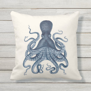 Illustration eines Navyblauen Kraken auf Creme Kissen