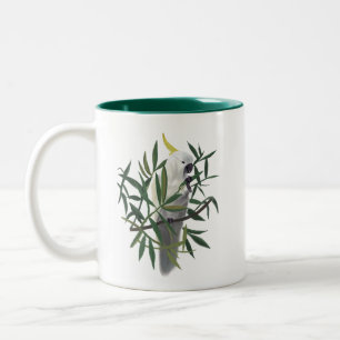 Illustration eines Schwefelkamm-Kakadus in einem B Zweifarbige Tasse